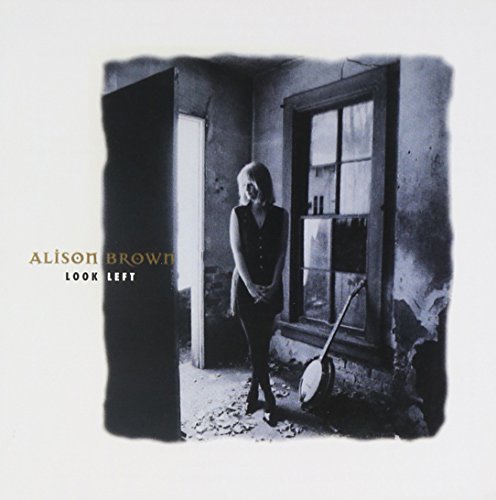 "Album cover: woman standing in a dimly lit, damaged room with a banjo."