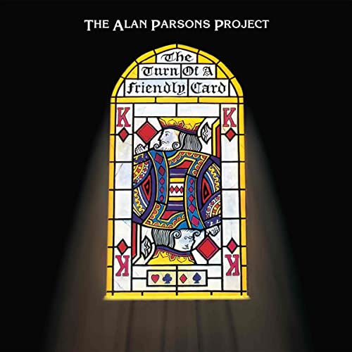 Album cover for "Turn Of A Friendly Card" featuring a stained-glass king.