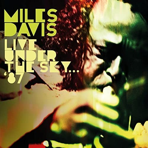 Album cover for Miles Davis’ “Live Under The Sky… ‘87” featuring a blurred portrait.