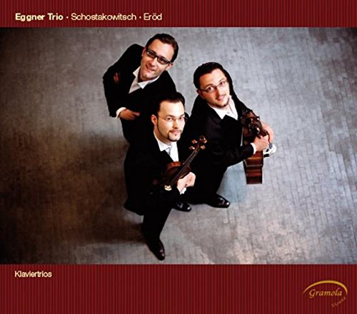 The image shows a CD cover with three men in black suits holding stringed instruments.