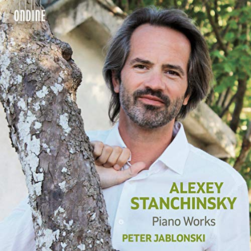 CD cover featuring pianist Peter Jablonski leaning against a tree.