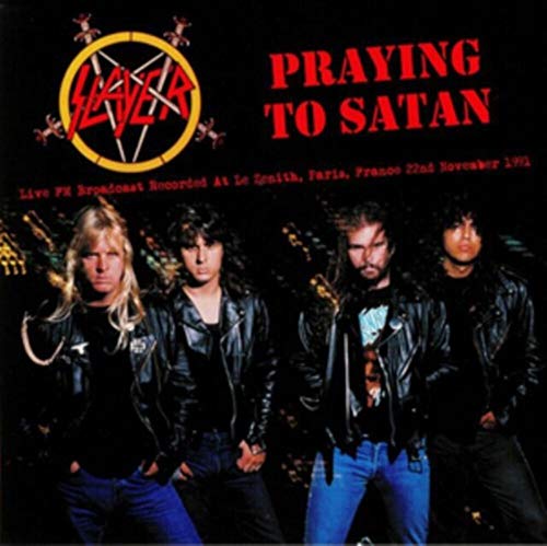 "Vinyl record cover featuring the band Slayer with four members standing together."