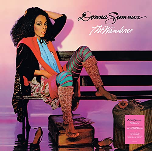 Donna Summer album cover, "The Wanderer," featuring a seated woman and luggage.