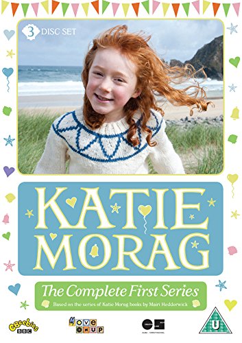 "Katie Morag DVD cover featuring a smiling red-haired girl on a beach."
