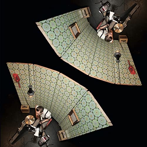 Vinyl album cover featuring two musicians playing drums in patterned rooms.