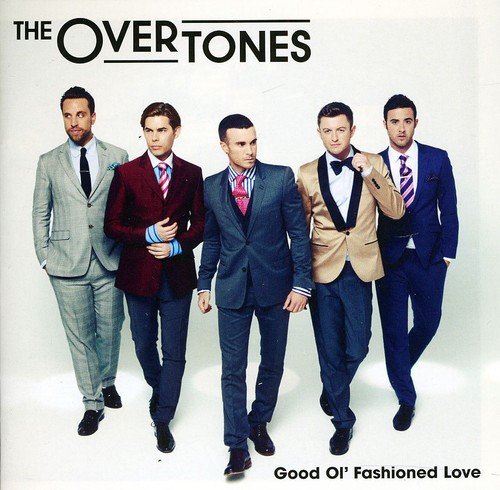 "Album cover featuring five men in suits, with band name and album title."