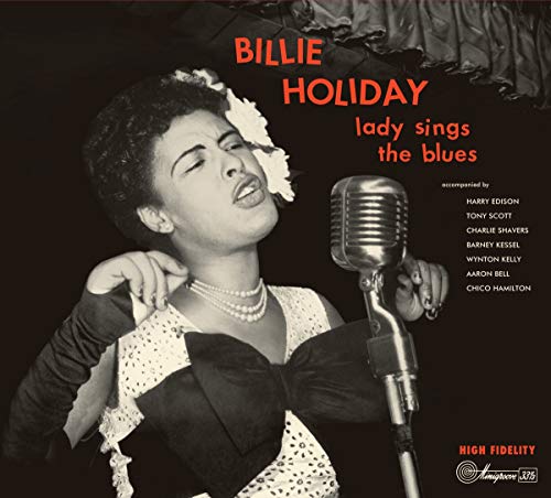 Billie Holiday album cover featuring a black-and-white photo of her singing into a microphone.