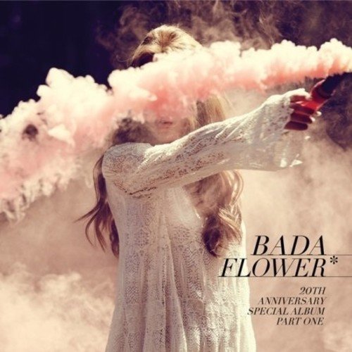 Woman in lace dress with pink smoke, album cover art.