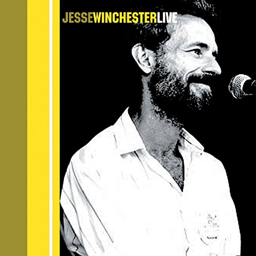 A black and white image of a man singing into a microphone, with yellow text overlay.