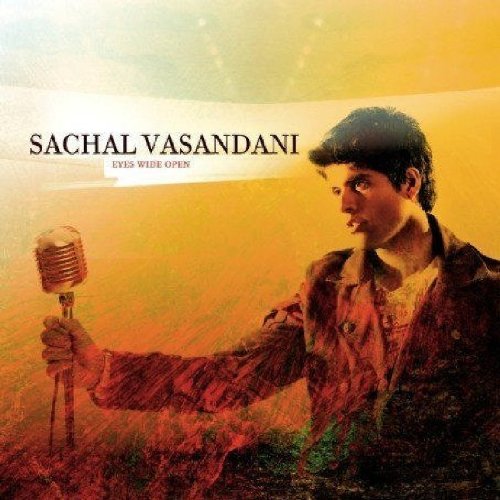 Album cover with a man holding a microphone, titled "Eyes Wide Open" by Sachal Vasandani.