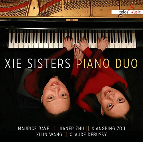 CD cover featuring two pianists at a grand piano, titled "Xie Sisters Piano Duo".
