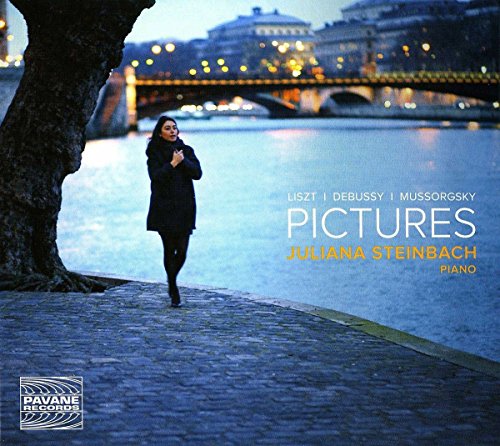"Album cover with a woman walking along a riverside path at dusk."
