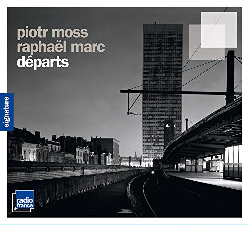 CD cover: black and white train station scene with tall building.