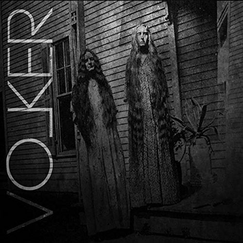 Black and white album cover featuring two ghostly figures in robes.