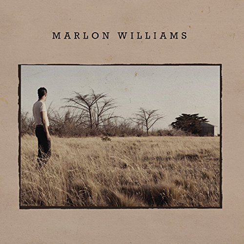 "Album cover with a man standing in a dry field, beige background."