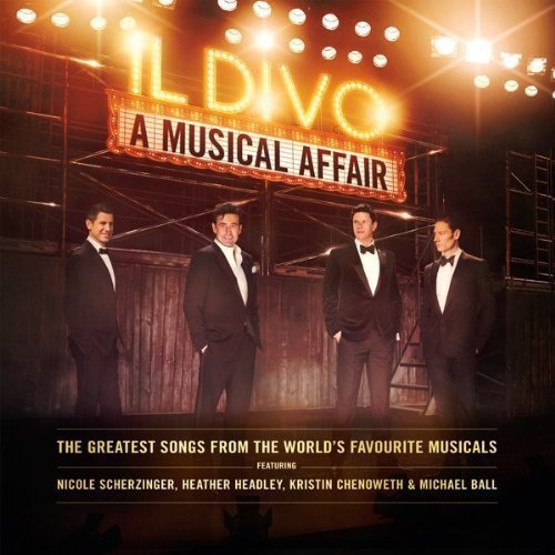 "Album cover featuring four men in tuxedos under a lit 'Il Divo' marquee sign."