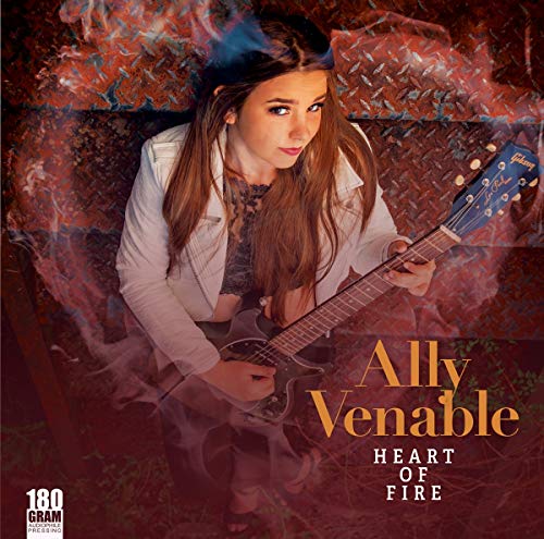 Young woman with guitar, album cover for Ally Venable’s “Heart Of Fire.”