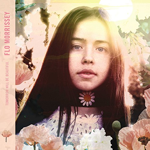 "CD cover art featuring a woman surrounded by flowers and foliage."