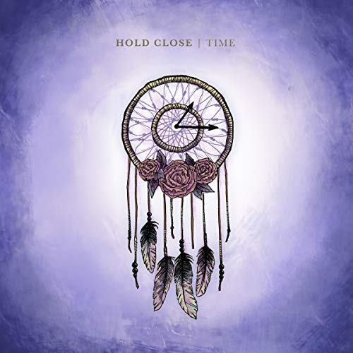 Album cover featuring a dreamcatcher with clock, flowers, and feathers on a purple background.