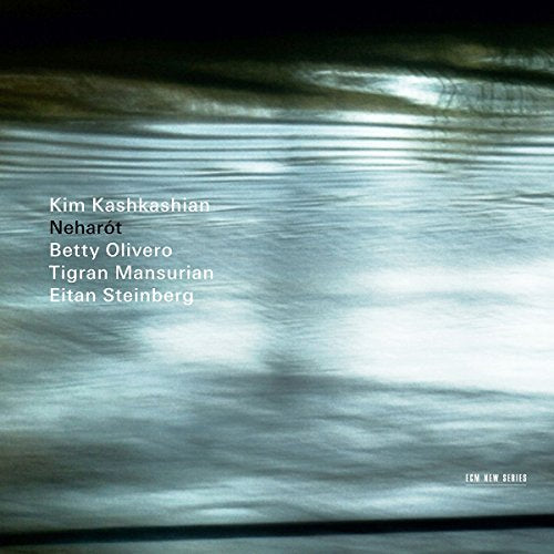 CD cover with abstract water reflection and artist/title text.
