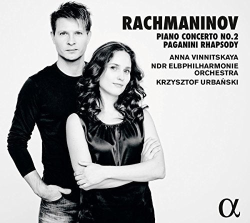 "CD cover with black and white photo of man and woman, text listing performers and compositions."