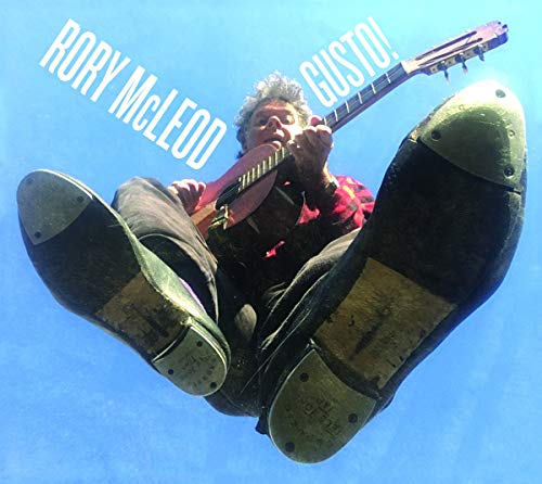 "Album cover featuring Rory McLeod playing guitar, floating in giant shoes against blue sky."