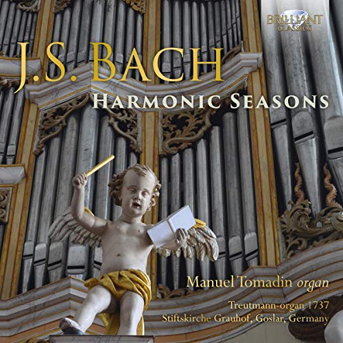 CD cover featuring a stone angel holding a book in front of an organ.
