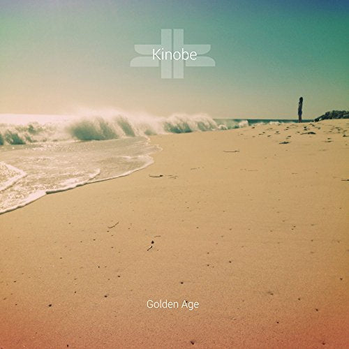 "CD cover featuring a sandy beach with waves and a person in the distance."