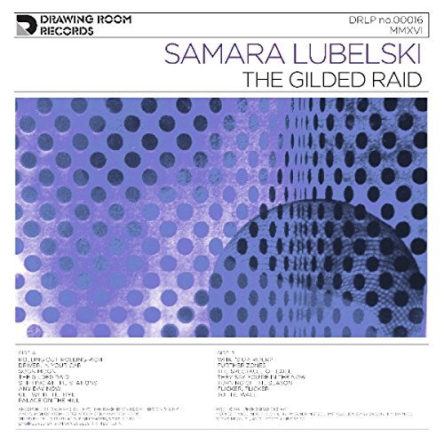 "Vinyl album cover with blue and purple dots and black text on white background."