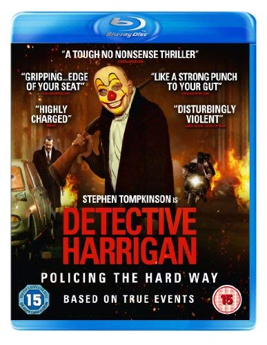 Blu-ray cover featuring a man in a clown mask holding a shotgun.