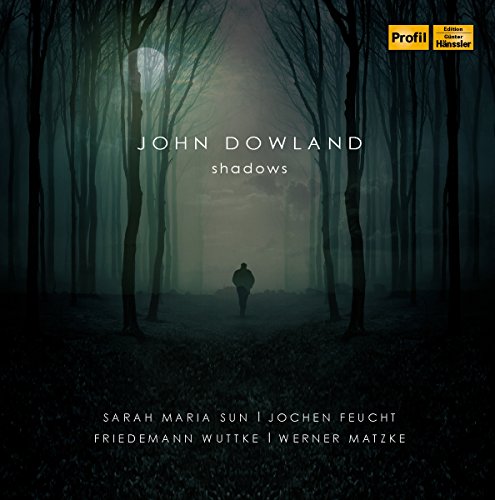 CD cover: lone figure in dark forest under a full moon.