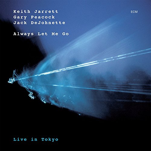 "Album cover with blue and black abstract design, featuring artist names and album title."