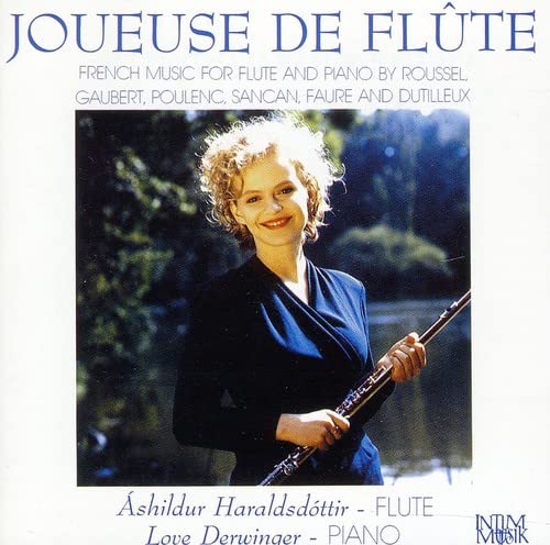 CD cover: flutist Ashildur Haraldsdottir with flute, outdoor background.
