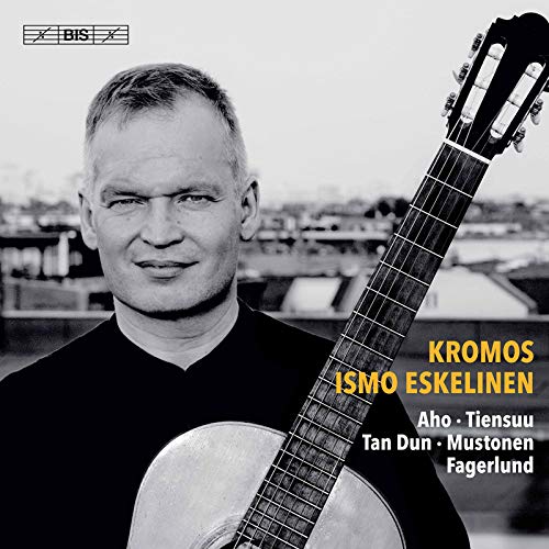 Close-up of guitarist Ismo Eskelinen with his classical guitar, album cover.