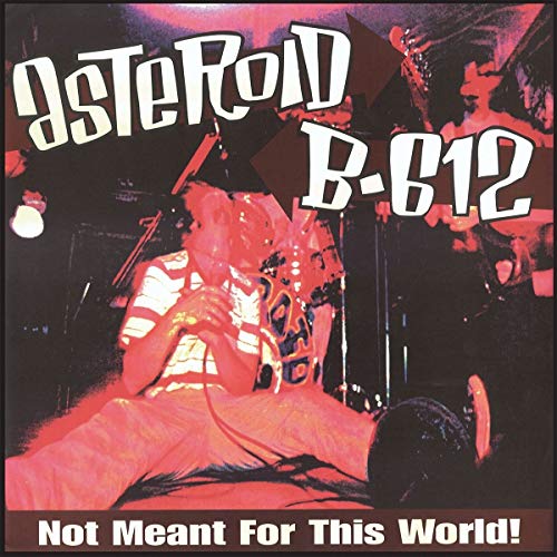 Vinyl album cover featuring a red-tinted image of a man playing guitar on stage.