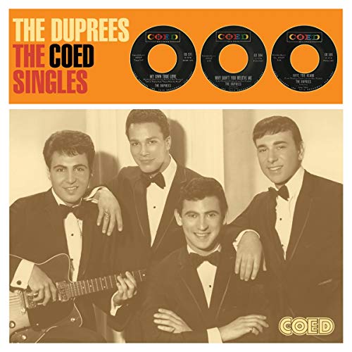 "CD cover with three men in suits and vinyl records on orange background."