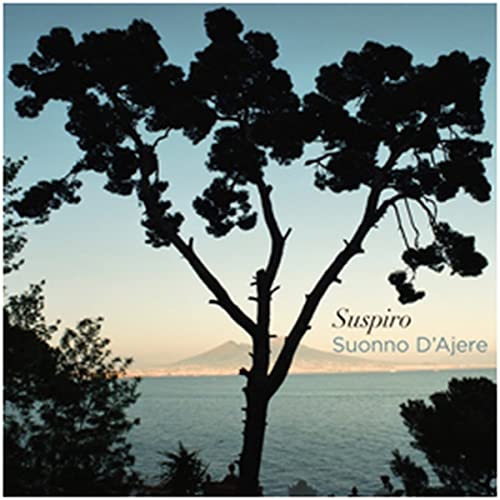 CD cover: silhouetted tree against a sunset over water and mountains.