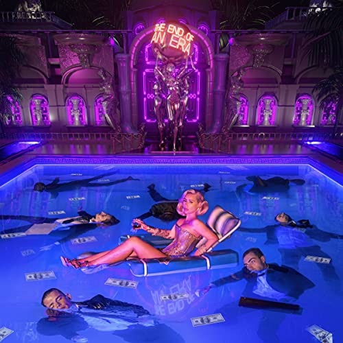 Iggy Azalea in a blue-lit pool with figures and neon sign.
