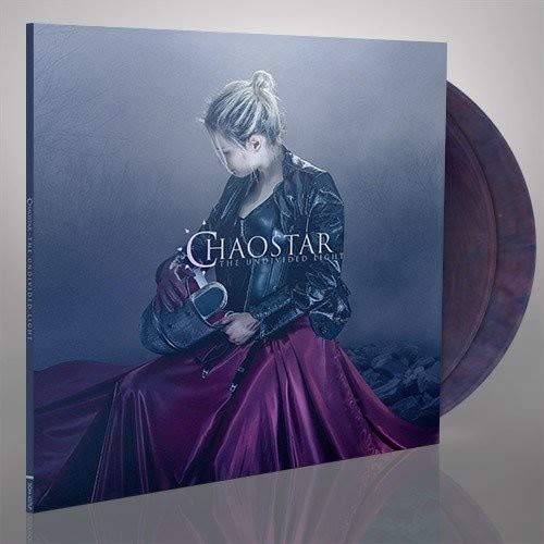 Album cover featuring a woman in dark clothing holding a silver mask.