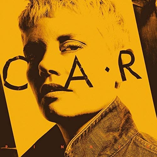 CD cover for "C.a.r." featuring a close-up of a person’s face.