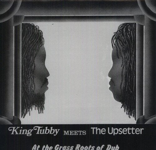 Black and white vinyl album cover with two men facing each other in a frame.