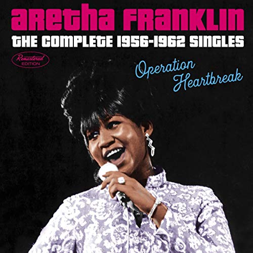 Aretha Franklin album cover, showing her singing into a microphone.
