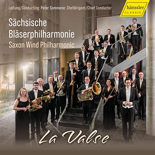 Saxony Wind Philharmonic ensemble in formalwear with brass instruments.