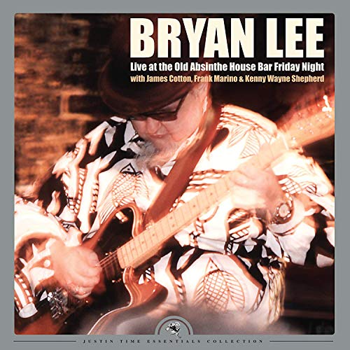 Vinyl album cover featuring a man playing an electric guitar.