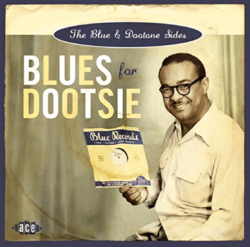 CD cover featuring a portrait of a smiling man holding a record.