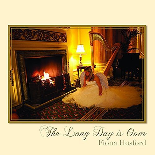 CD cover with a woman in a white dress by a fireplace.