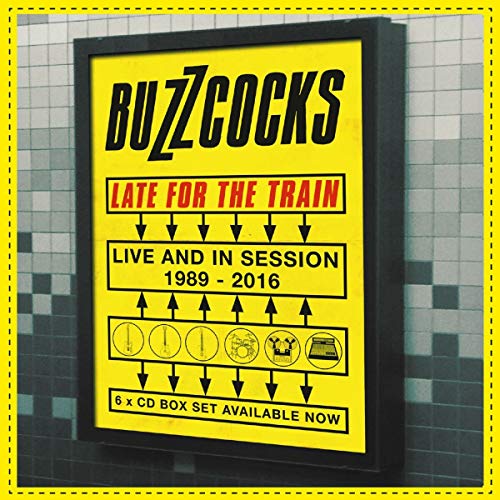 "Yellow poster with 'BUZZCOCKS' and 'LATE FOR THE TRAIN' text, against a tiled wall."