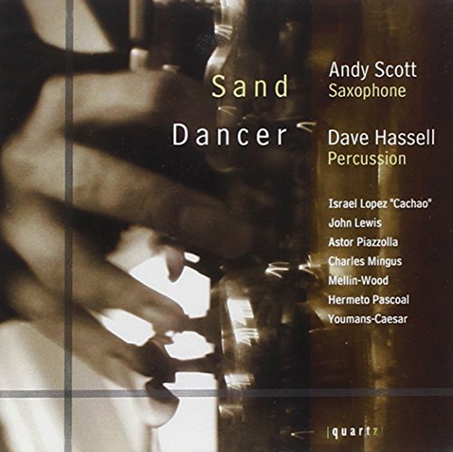 "CD cover with sepia-toned image of hands playing percussion, artist and track names listed."