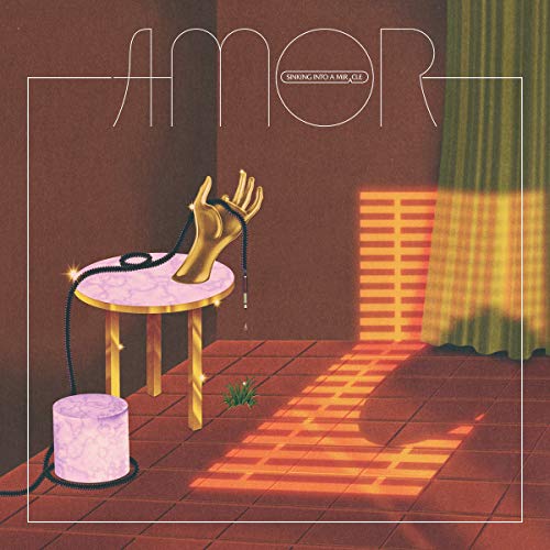 Album cover: surrealist image with a gold hand, table, and light beams.