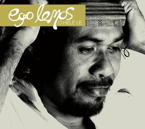 Black-and-white album cover featuring a man adjusting a patterned headband on his head.